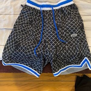 Nike basketball athletic shorts. Color- black, white, blue.